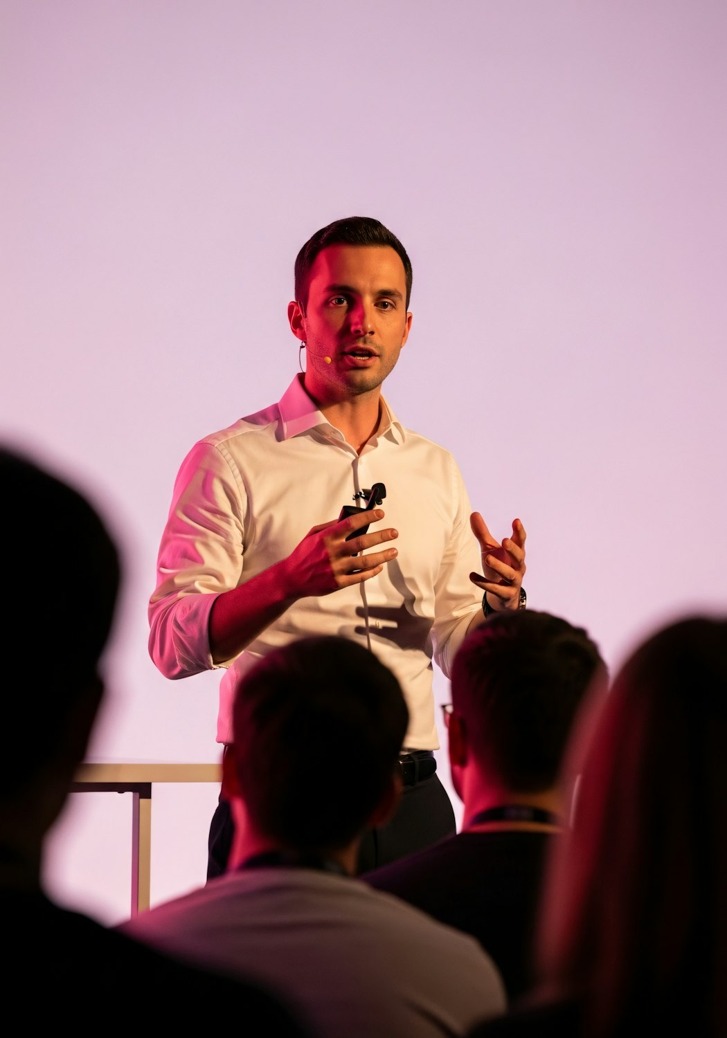 A speaker connecting with an audience, symbolizing the importance of genuine interaction and trust in content creation.