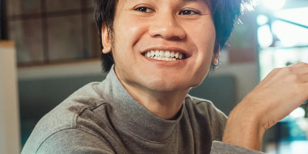An individual engaging openly and transparently with others, fostering trust and connection.