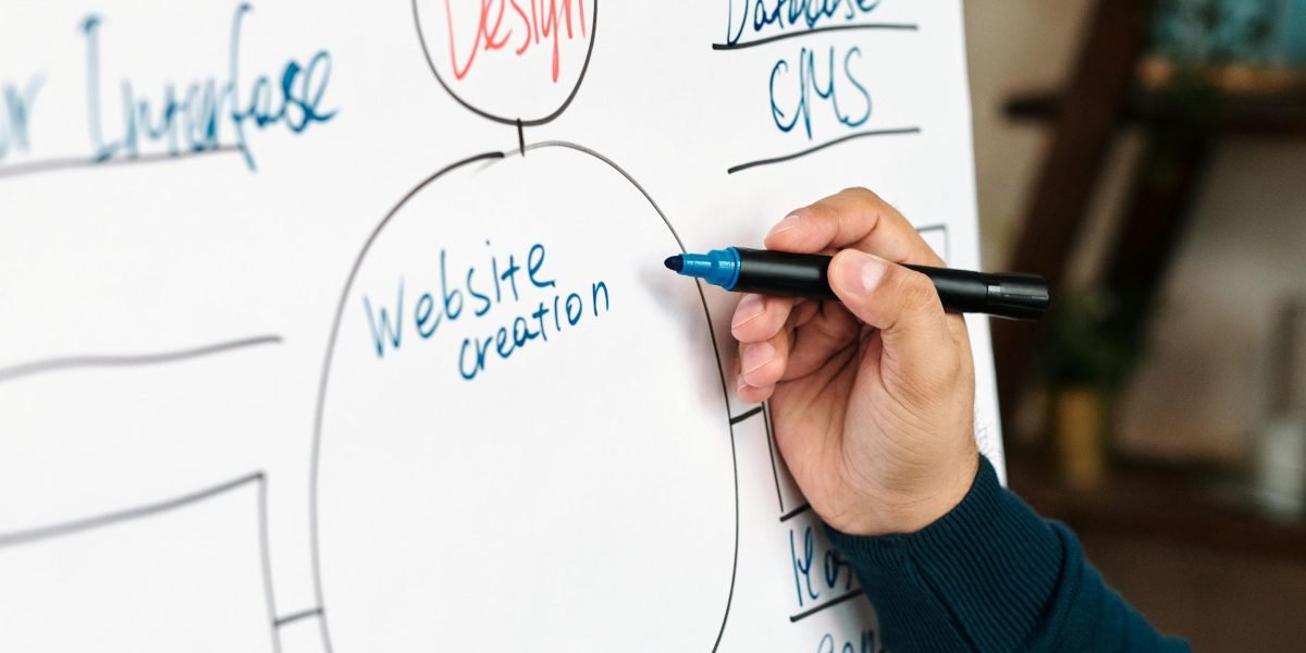 A person thoughtfully planning their approach to digital marketing, leveraging new strategies.