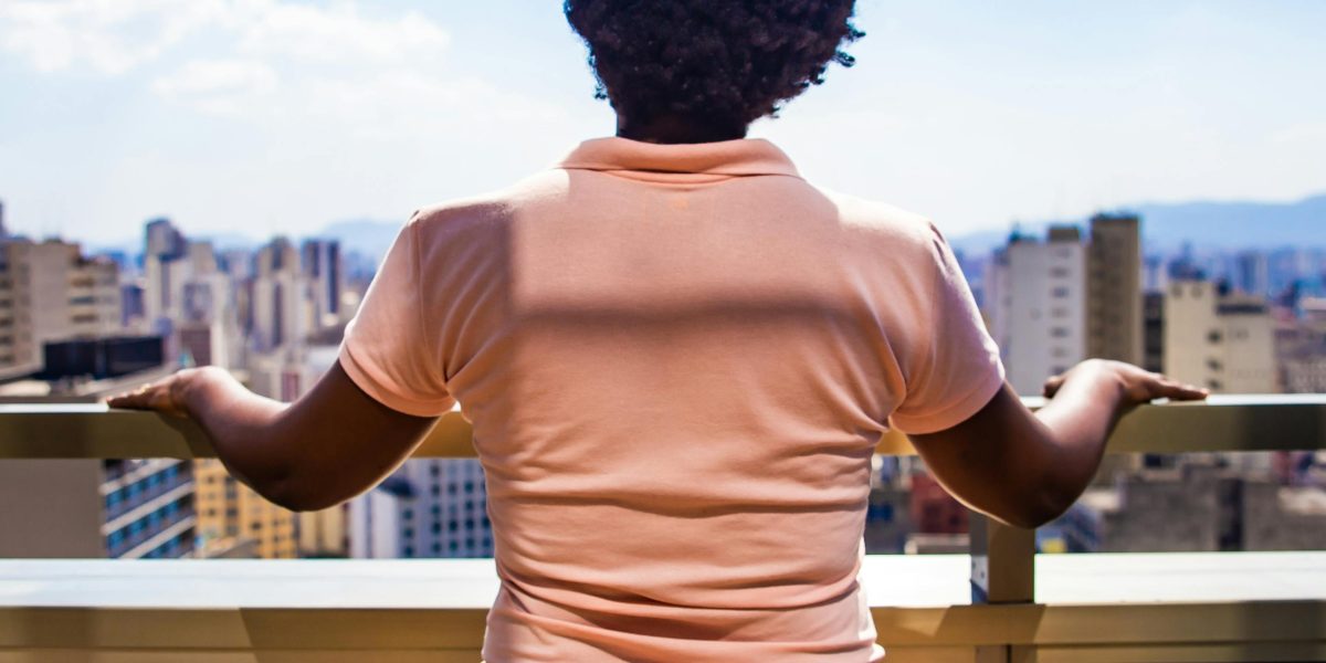 A person looking towards the future, symbolizing anticipation and adaptation to new marketing trends.