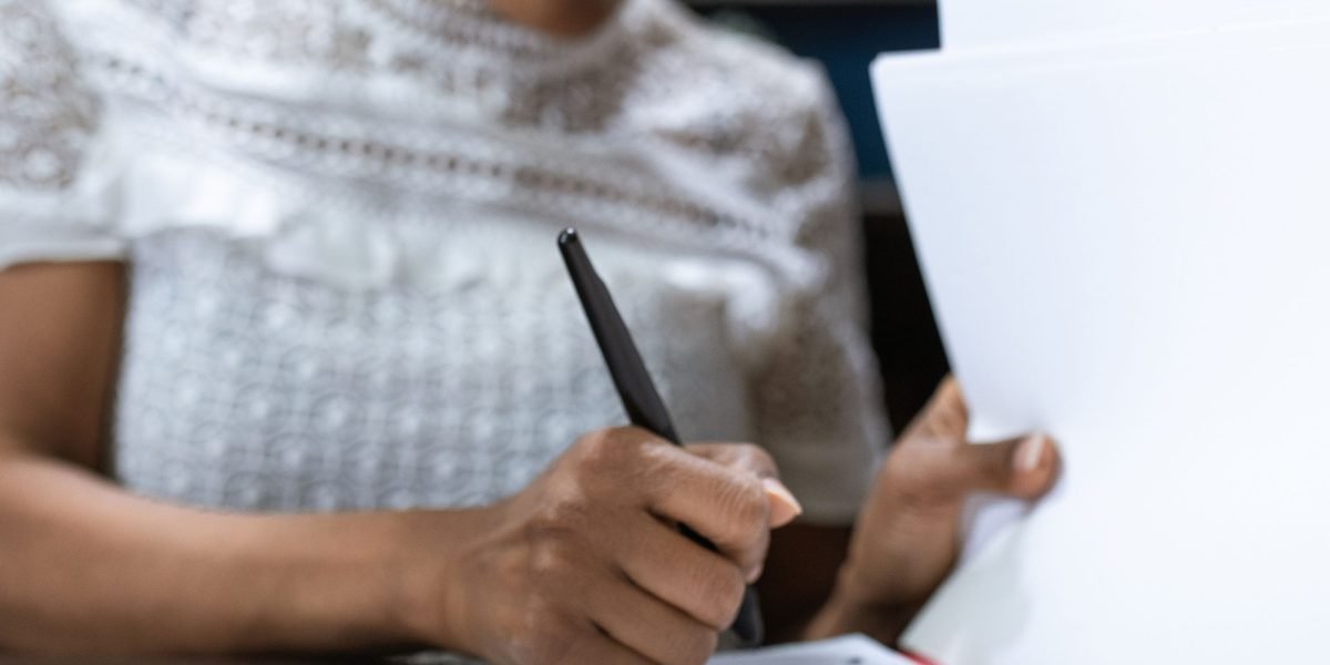 A professional carefully evaluating options to make informed decisions for an affiliate program.