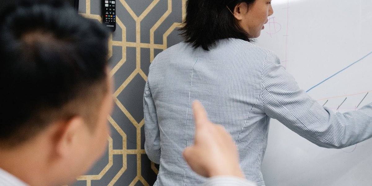 A team collaborating on a strategy, using data analysis to make informed decisions for affiliate marketing optimization.