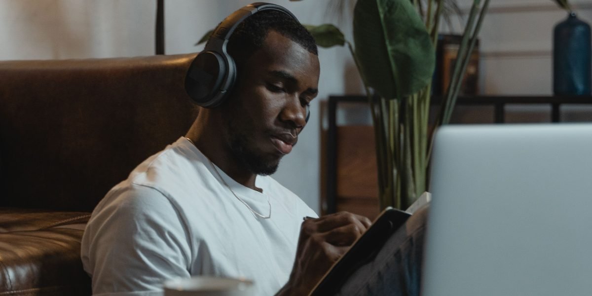 A person engaging in online learning, representing the process of understanding and joining the affiliate program.