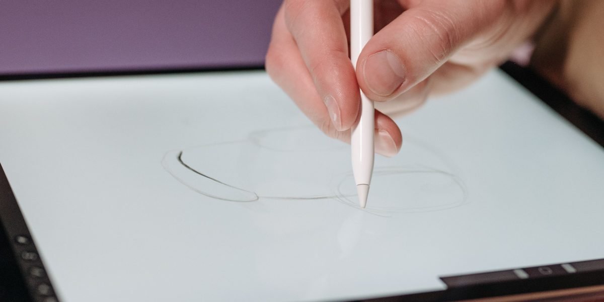 A designer focused on creating user interfaces, representing the creative aspect of UX/UI design careers.