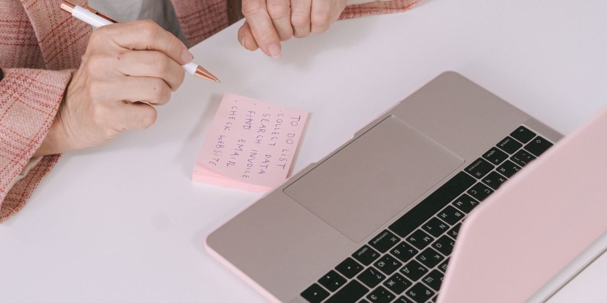 A person managing multiple tasks, representing the challenge and efficiency needed for managing several affiliate programs.