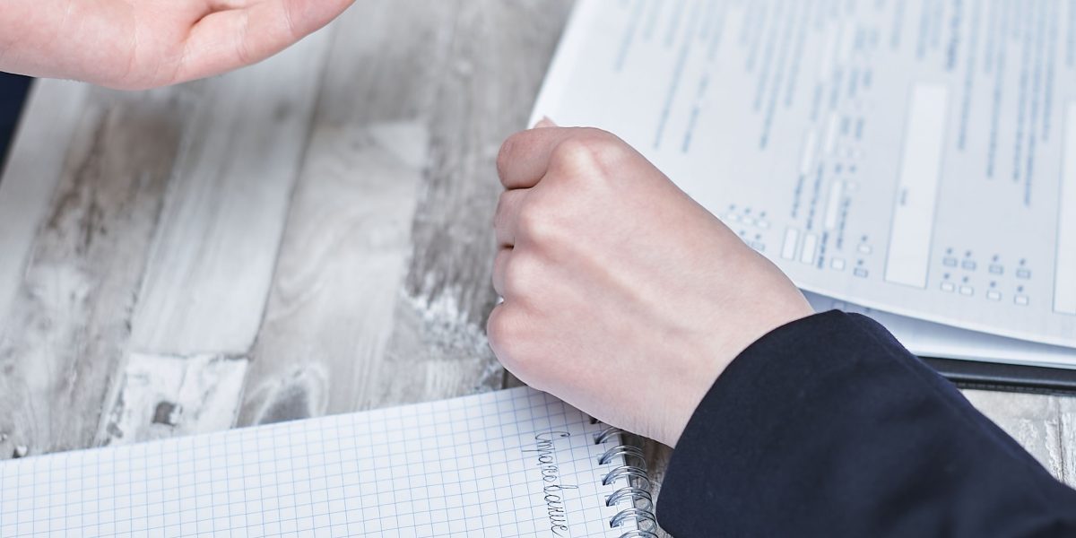 A professional evaluates various options, symbolizing the careful selection process for affiliate programs.