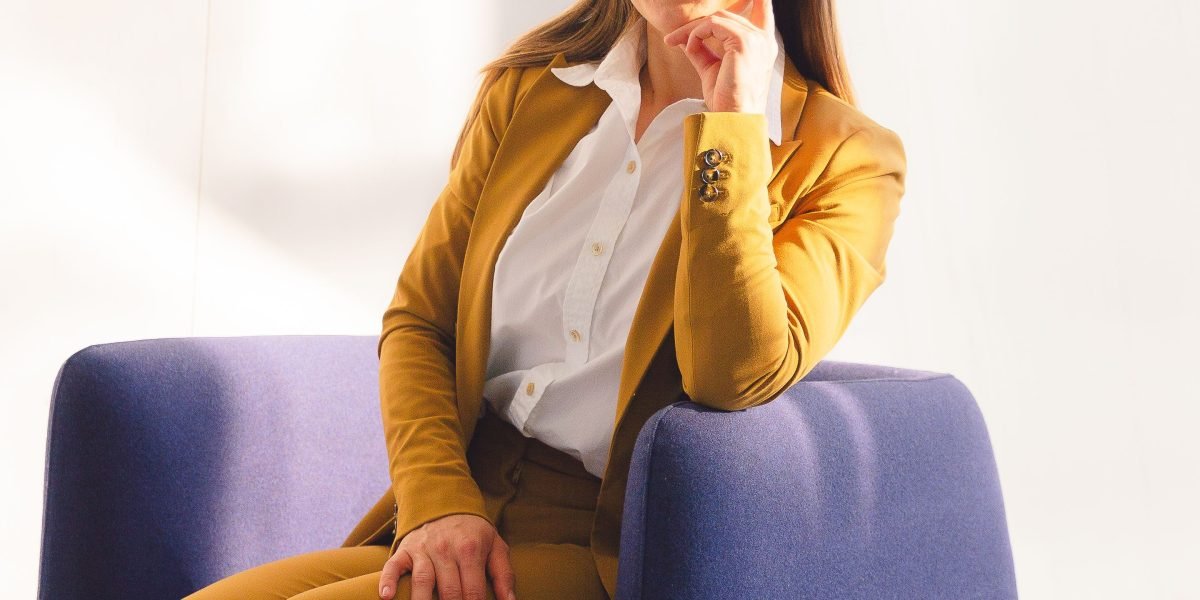 A confident individual smiling, symbolizing success in online ventures like affiliate marketing.