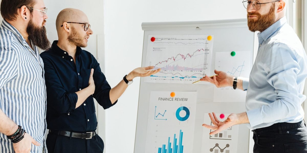 A team actively collaborating, symbolizing the scaling tactics of partnerships and strategic growth in business.