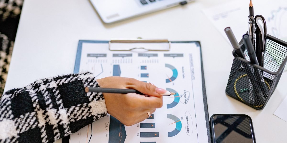 A person reviews a dashboard, representing the clear tracking and analytics offered by the network.