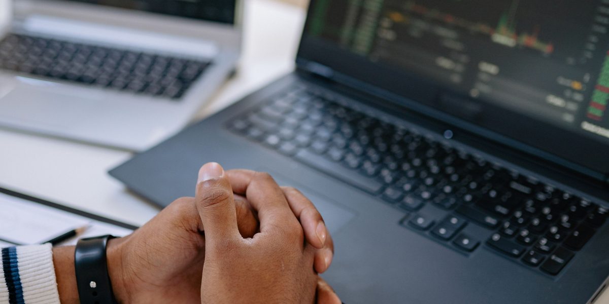 A person deeply focused on data analysis, highlighting the need for smart, adaptable tracking solutions.