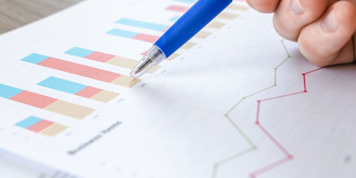 A professional analyzing performance data and reports to optimize an affiliate program.