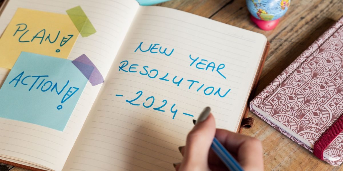 An individual thoughtfully planning their financial goals, representing the predictable income and strategic planning involved in recurring commissions.